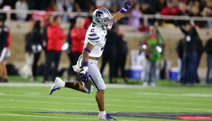 Kansas State safety Kobe Savage celebrates a big play against Texas Tech,